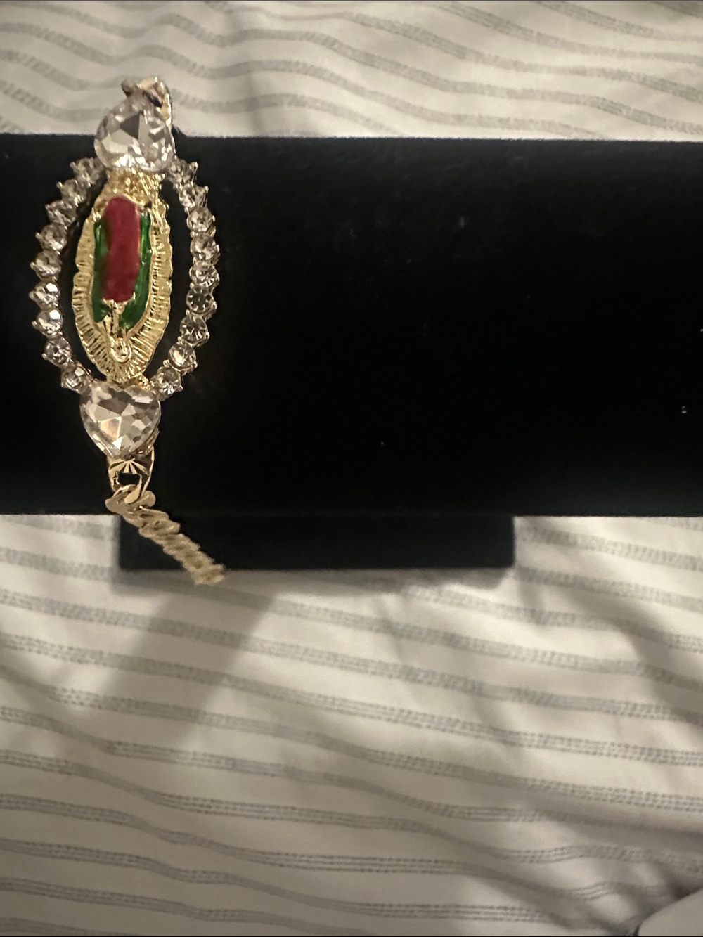 Gold-Tone Religious Pendant Bracelet with Red and Green Accent